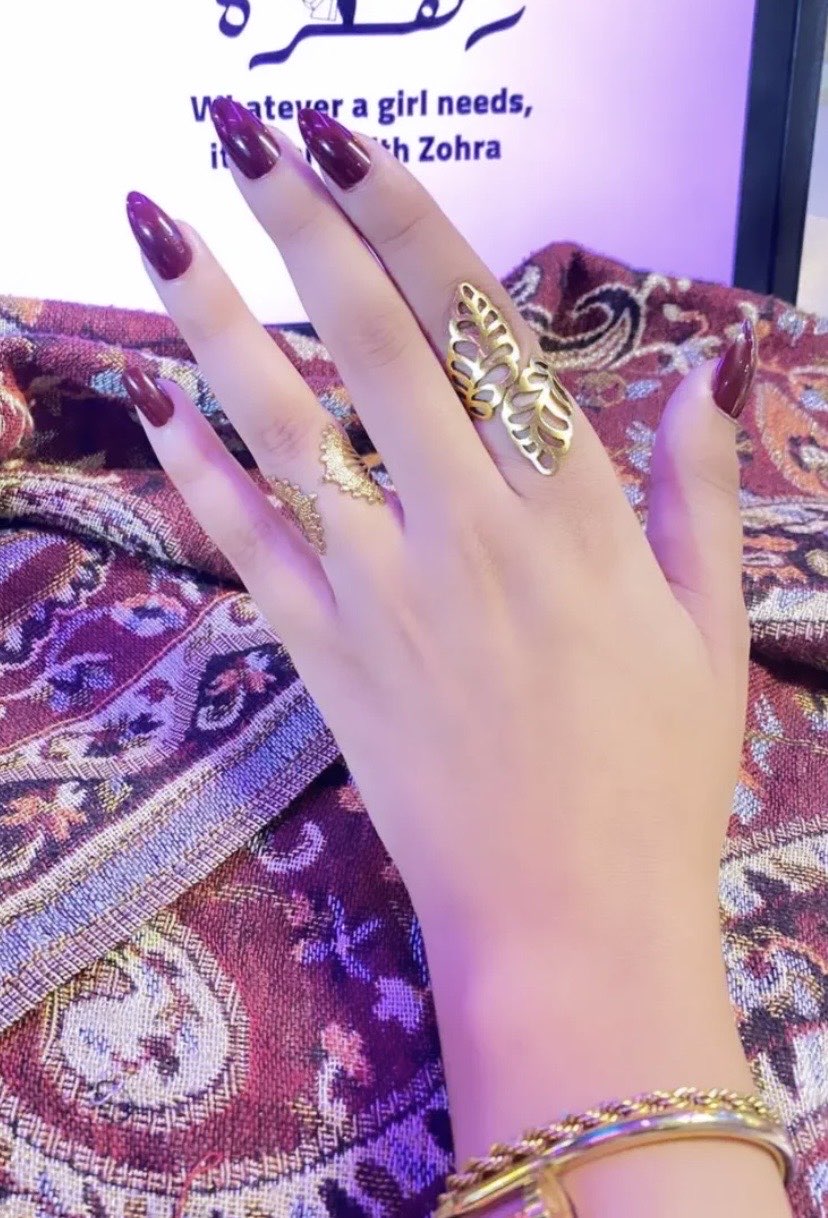 Gold ring on hand